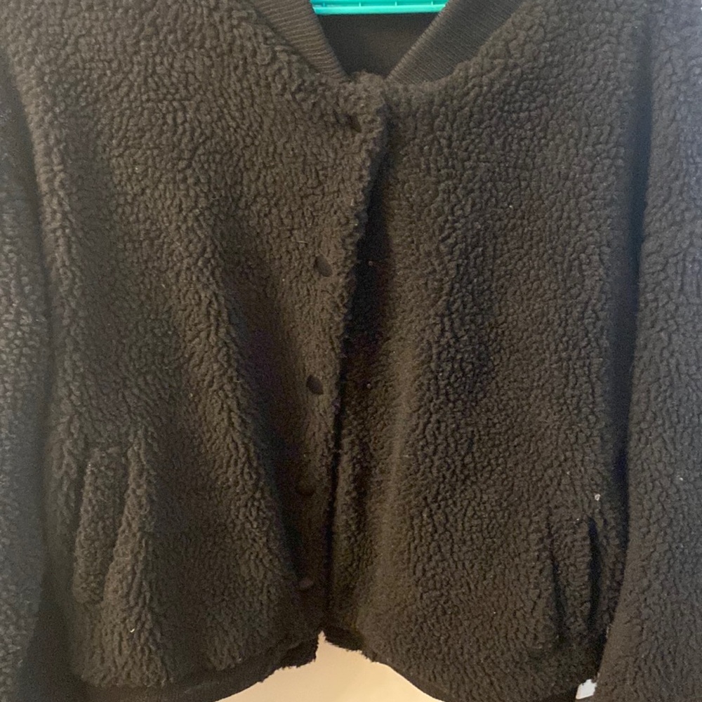 Super trendy Sherpa like black jacket from Forever 21